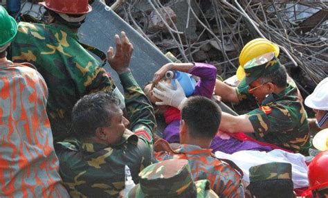 Dhaka Building Collapse Smiling Woman Survivor Found In Bangladesh