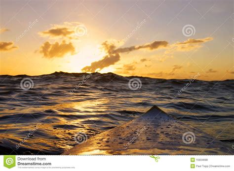 A Surfers View Of A Beautiful Sunset On The Ocean Stock
