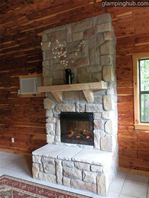 Fittingly, the treehouses are all named after tree types—poplar, persimmon, cherry—and. Gorgeous fireplace in Missouri treehouse. www.glampinghub ...