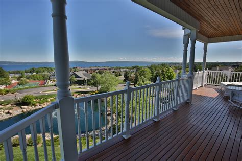Fitness center on 3rd floor with views overlooking pool common area and. Petoskey condo for sale with Lake Michigan views and ...