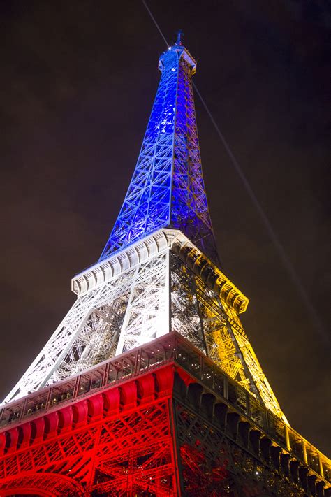 The eiffel tower can be found on the champs de mars at 5 avenue anatole france within the 7th arrondissement of paris. Free Images : night, eiffel tower, europe, flag, landmark ...