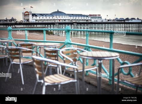 Brighton Seafront Cafe Cyclist And Pier Hi Res Stock Photography And
