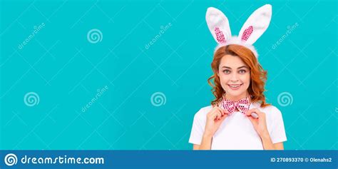 Happy Cheerful Easter Woman In Bunny Ears And Bow Tie On Blue