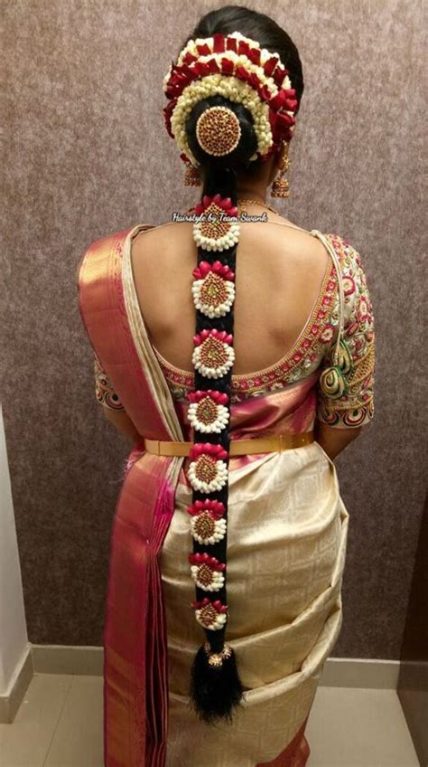 The best south indian bridal hairstyles handpicked for you to sail through your wedding day. Pretty and simple bridal hairstyle by Team Swank. Bridal ...