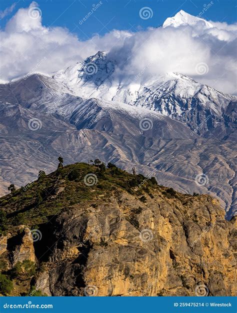 Vertical Shot Of The Beautiful Nilgiri And Annapurna Mountain Ranges In