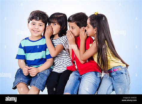 4 Indian Indian Kids Friends Whisper Stock Photo Alamy