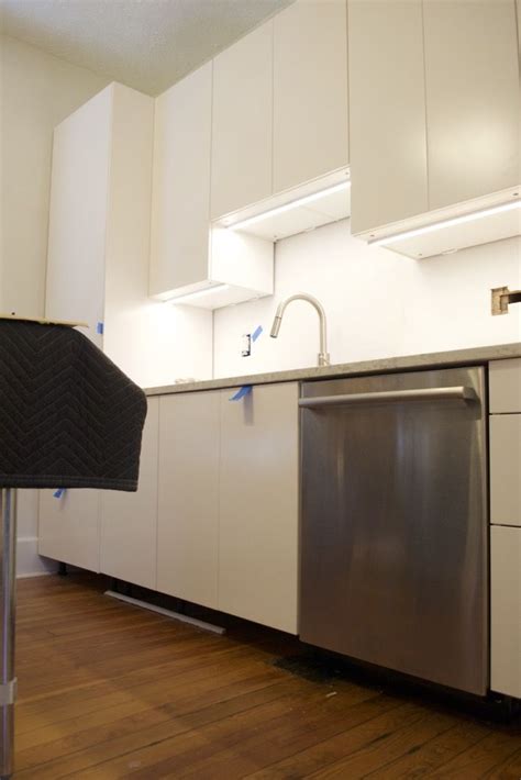 If you want cheap under cabinet lights, then go with the led strip lights but if you want your kitchen to look like the one in the video spend a little more money on the getinlight led undercabinet lights. Tips for Installing Ikea Under Cabinet Lighting — The ...