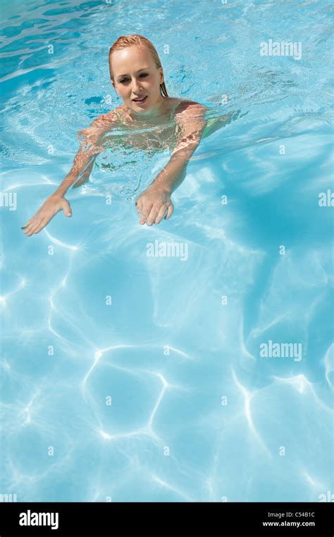 Beautiful Woman Swimming In A Pool Stock Photo Alamy