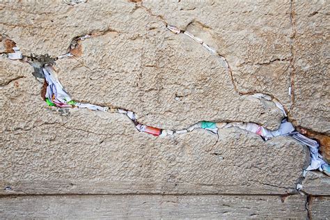 A Stone Of The Wailing Wall Western Wall Kotel With Many Prayer