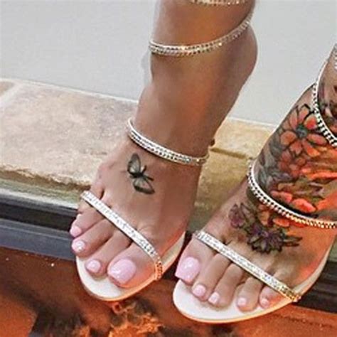 This mans name isnt even future! Blac Chyna Butterfly, Flower Foot Tattoo | Steal Her Style