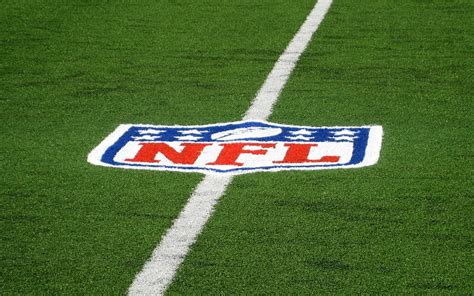 Nfl Logo National Football League Emblem Nfl Logo On The Grass