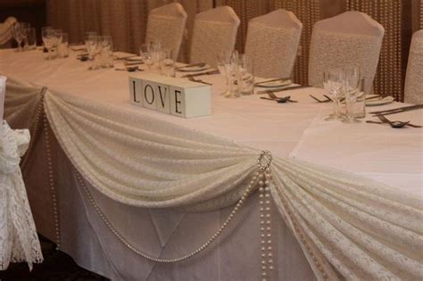 Check out our pearl wedding decor selection for the very best in unique or custom, handmade pieces from our party décor shops. Wedding Head Table Decor Idea - Love the lace and pearls ...