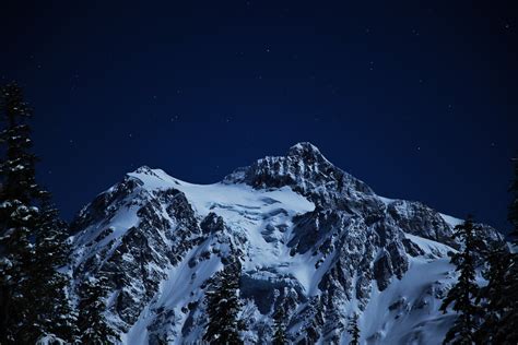 Photo Of Snow Capped Mountain During Nighttime · Free Stock Photo