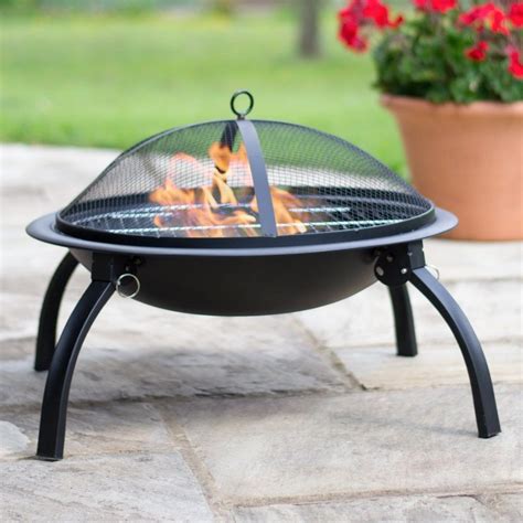 A campfire in a can, so to speak. Steel Camping Fire Pit BBQ with Folding Legs FREE BAG ...