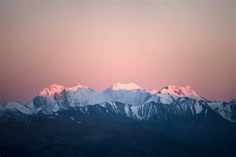 Snowy Mountain Peaks In Pink Sky · Free Stock Photo