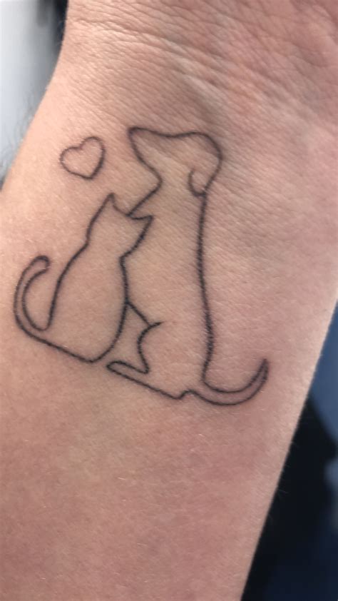 Cat And Dog Tattoo Dog Tattoos Foot Tattoos For Women Cat And Dog