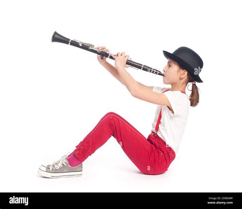 Little Girl Playing Clarinet On A White Background Stock Photo Alamy
