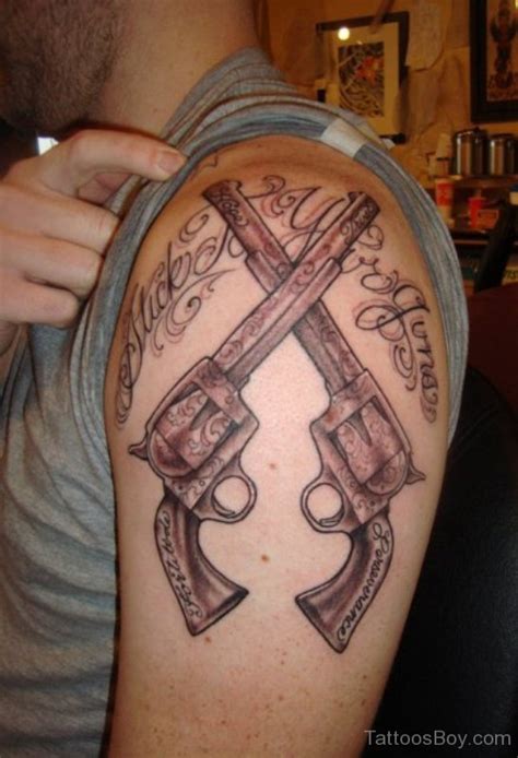 Gun Tattoo On Shoulder Tattoo Designs Tattoo Pictures