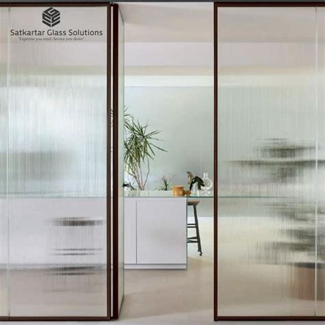 fluted glass sleek doors [video] in 2021 glass partition wall glass doors interior glass