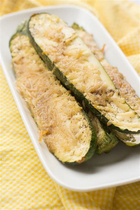 Here's a really quick & easy baked zucchini recipe that takes 3 minutes to prep. Baked Parmesan Zucchini | RecipeLion.com