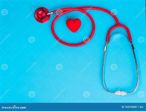 Red Heart And Stethoscope On On Blue Background Stock Photo Image Of