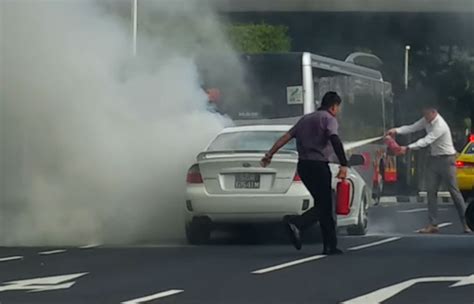 sbs transit bus driver stopped mid ride sought passengers permission to put out fire on road
