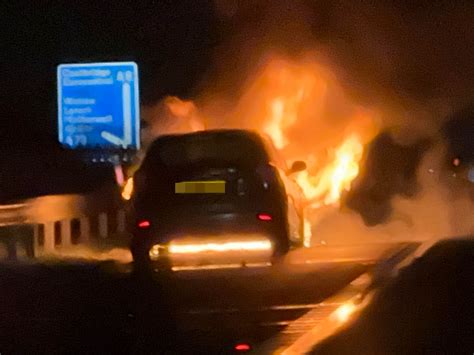 shocking moment car bursts into flames as cops close busy motorway the scottish sun