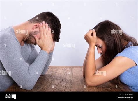 Young Couple Sitting Opposite Other Hi Res Stock Photography And Images