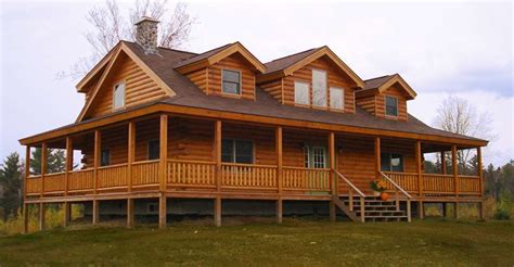 The Ledgewood Log Home Has A Huge Wrap Around Porch