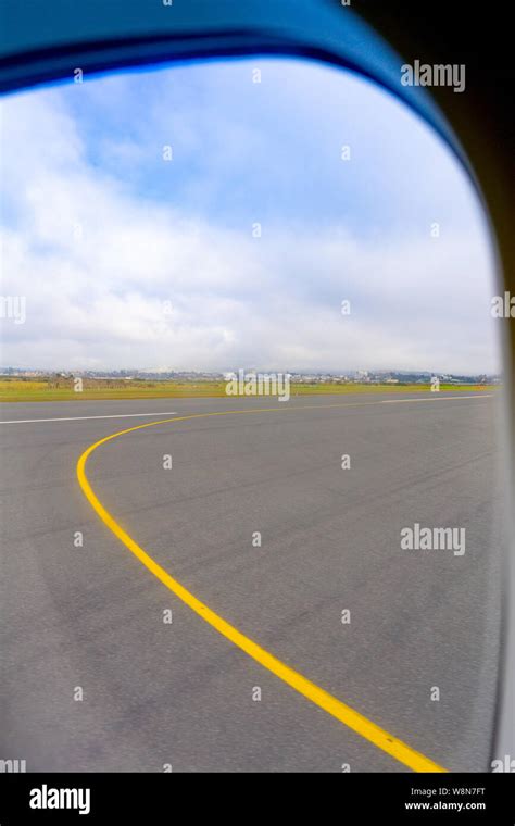 Tauranga Airport Runway Through Plane Window Before Take Off With Long