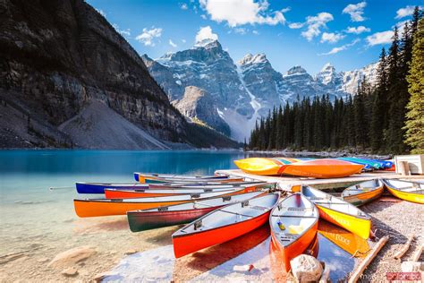 Matteo Colombo Travel Photography Colorful Canoes Moraine Lake