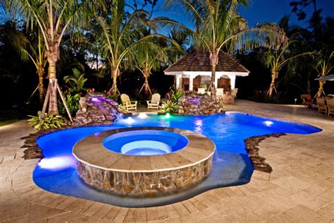 Lagoonfreeform Swimming Pool With Raised Spa And Led Lights In Coral Springs Tropical Pool