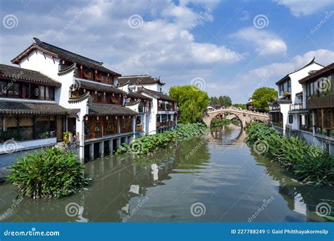 Traditional Chinese Teahouses And Buildings Along The Riverbank Of The