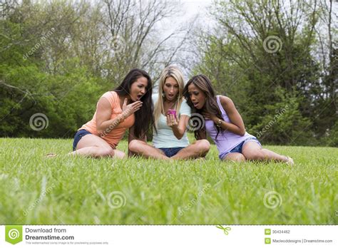 This is a great song! Three Beautiful Surprised Woman Sitting In The Park Stock ...