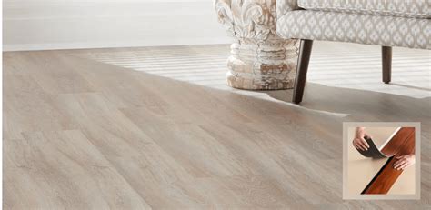 What does transition pieces look like when installed with vinyl flooring | vinyl is completely waterproof and is ideal for any room. Vinyl Flooring - Barker Kappelle Construction, LLC