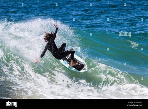 Surfer Riding A Wave At The Wedge Newport Beach California Usa Stock