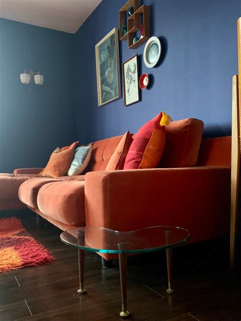 Our Midcentury Lounge With Blue Walls And Orange Sofa