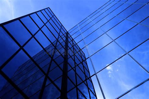 Business Building Highrise Mirrored Windows With Sky And Clouds Stock