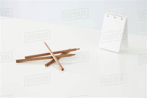 Colored Pencils And Blank Notebook Stock Photo Dissolve
