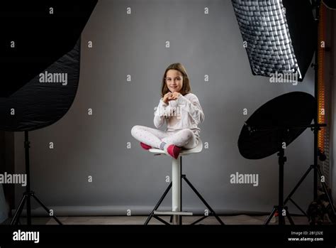 Photographing Children In Professional Photo Studio With Lighting