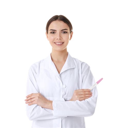 Linda médica com teste de gravidez em fundo branco Foto Premium