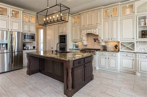 The beautiful cream finish is enhanced by the brushed glaze. Distressed Kitchen Cabinets (Design Pictures) - Designing Idea