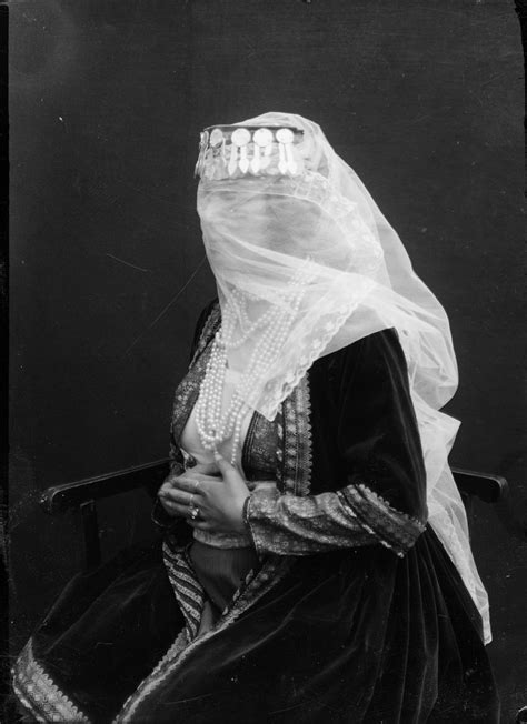 Studio Portrait Seated Veiled Woman With Pearls Searching For