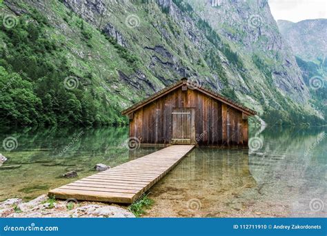 Mountain Lake Mountain Lake With Dock And Boat House Stock Photo