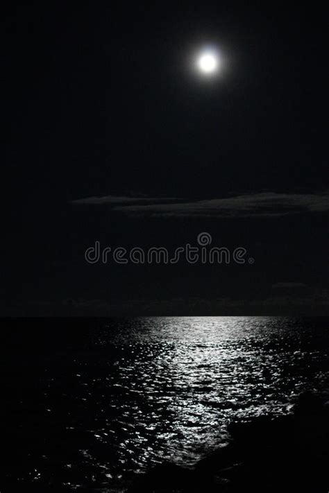 Reflection Of The Moonlight On The Sea Bed During A Full Moon Day Stock