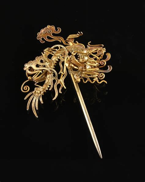 A Pair Of Chinese Hair Pins 20th Century Each A Highly Stylized