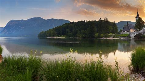 1920x1080 Dawn Lake Houses Grass Forest Mountains Coolwallpapersme