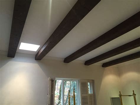 Fake wood faux wood beams timber ceiling beadboard ceiling wood columns painted ceiling beams concrete wood decorative ceiling tile beadboard ceiling panels. DIY Ceiling Beams Stained, Installed | Faux Wood Workshop