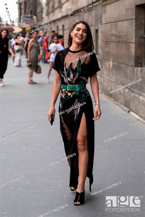 Blogger Camila Coelho Attending The Elie Saab Runway Show During Haute
