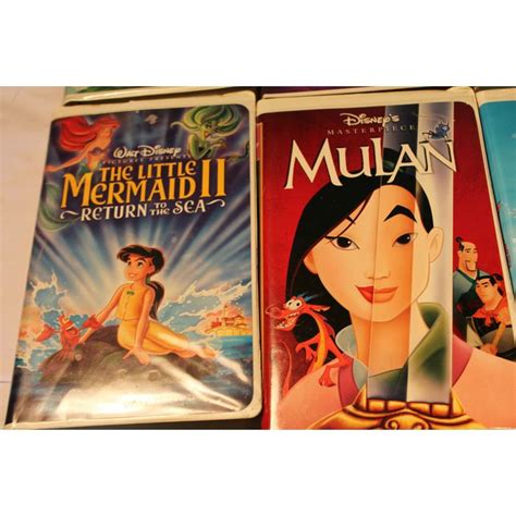 Lot 18 Disney VHS Movies Mulan Tarzan The Lion King Aladdin